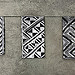 Vincent Vulsma Zaandam, Holanda, 1982; vive en Ámsterdam Foreign Exchange, 2011 Tufted Textile WE 461 Telar de Jacquard, hilados de algodón color crudo, fibra negra de rayón de rafia Tufted Cloths S1016